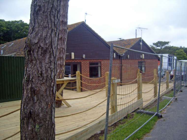 Decking Man o' War Caravan Park Durdle Door - Emerald Painters Portfolio