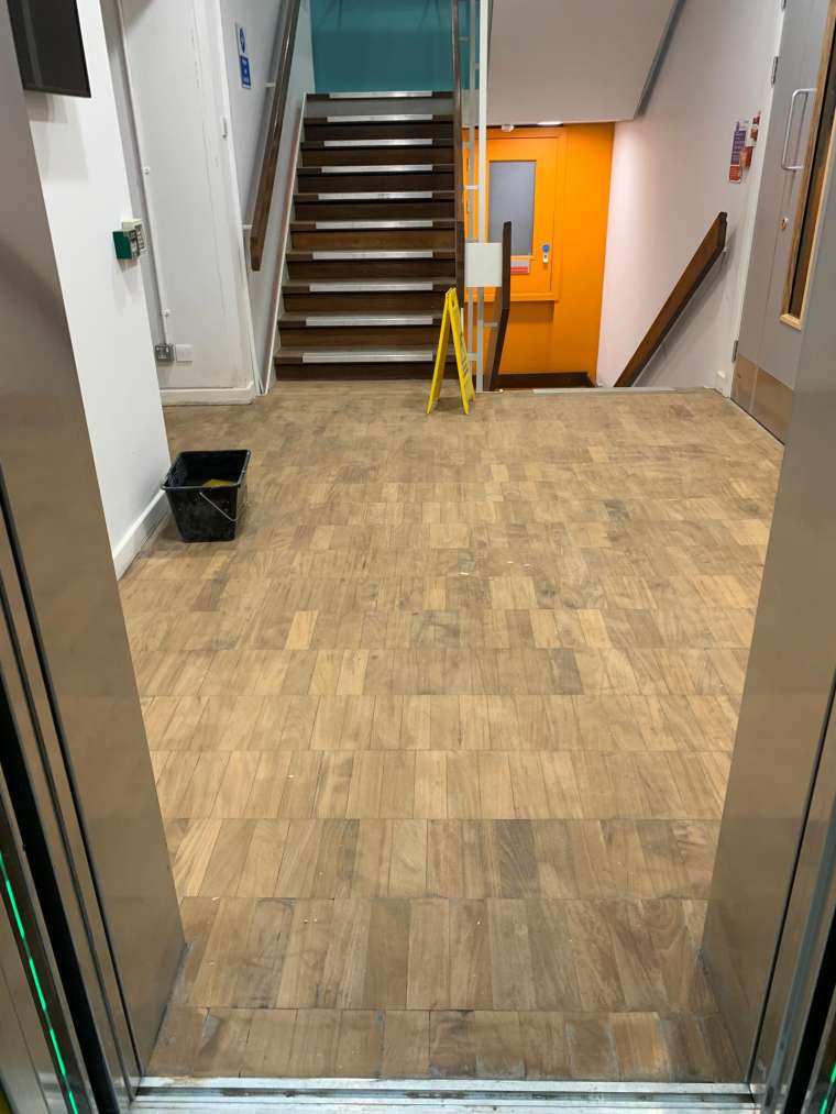 Southampton University - Restoration of Parquet Flooring with Intumescent Varnish - Before - Emerald Painters Portfolio