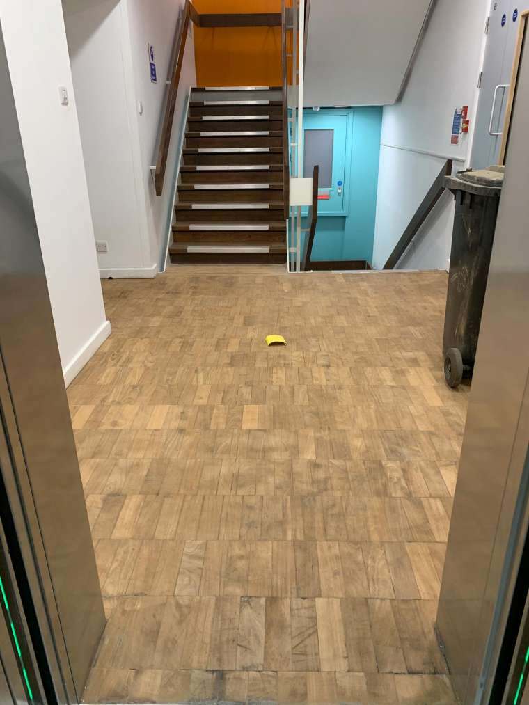 Southampton University - Restoration of Parquet Flooring with Intumescent Varnish - Before - Emerald Painters Portfolio