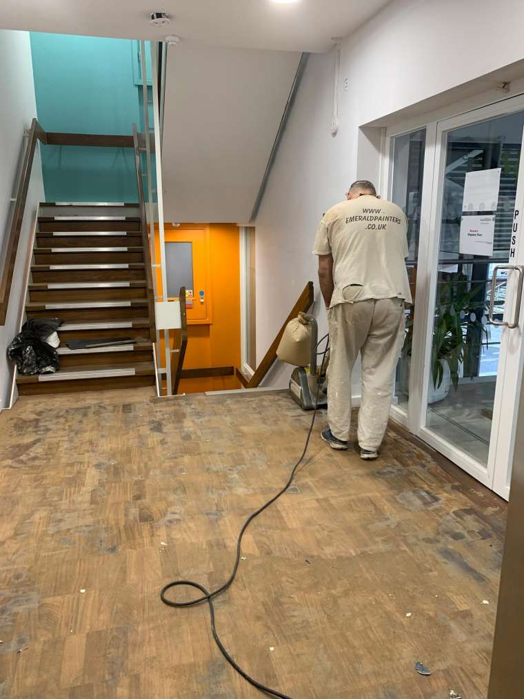 Southampton University - Restoration of Parquet Flooring with Intumescent Varnish - In Progress - Emerald Painters Portfolio