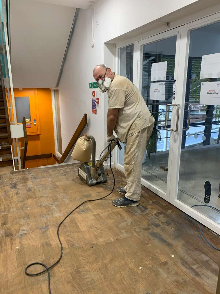 Southampton University - Restoration of Parquet Flooring with Intumescent Varnish - In Progress - Emerald Painters Portfolio