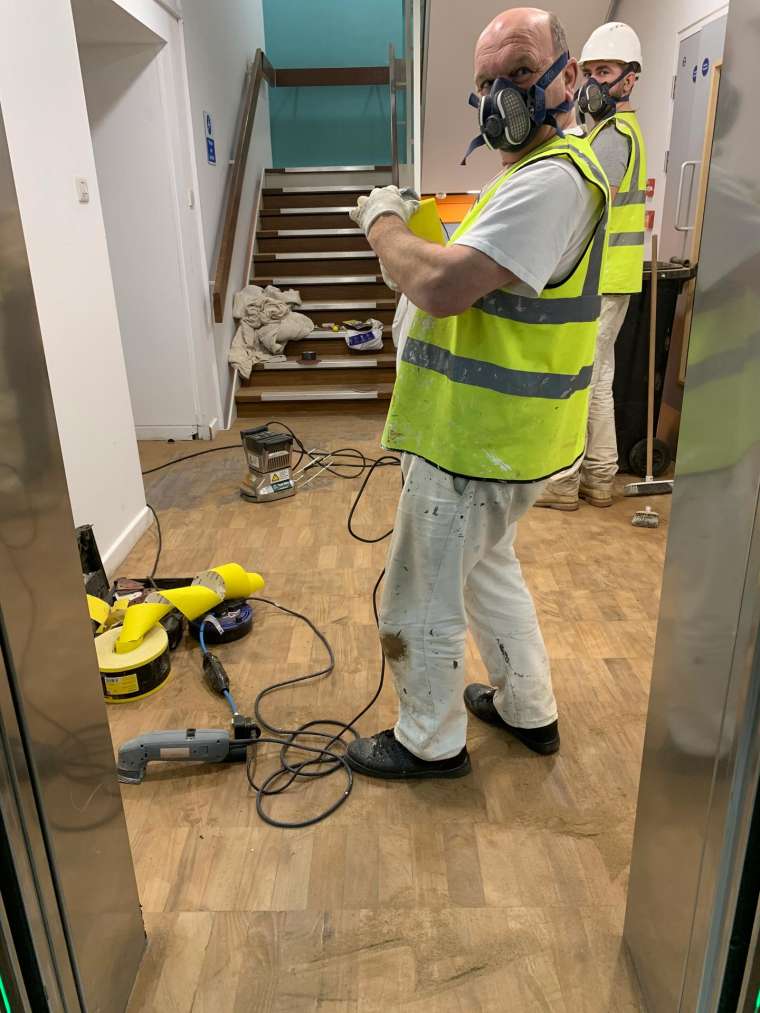 Southampton University - Restoration of Parquet Flooring with Intumescent Varnish - In Progress - Emerald Painters Portfolio